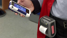 A modified iPod and printer that lobby assistants in 50 retail facilities are using to test the Mobile Point of Sale system