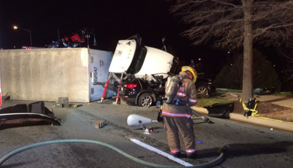 Video: 2 Seriously Injured After USPS Truck Lands on SUV