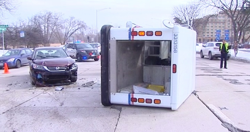 No one hurt when mail truck rolls over in Skokie Illinois crash