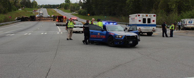 Georgia Postal Employee killed in wreck with logging truck
