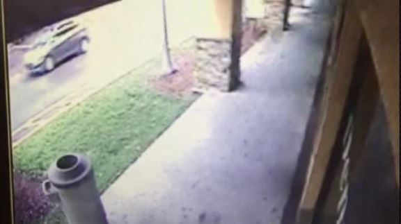 Video of getaway car in robbery of postal worker released