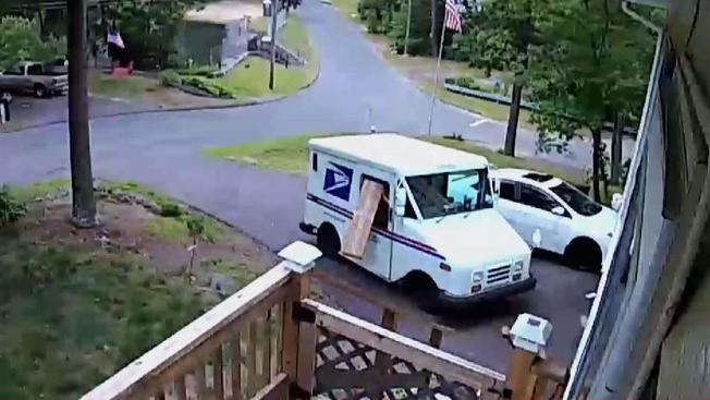Mail_Carrier_Caught_on_Camera_Tossing_Package_Out_Window